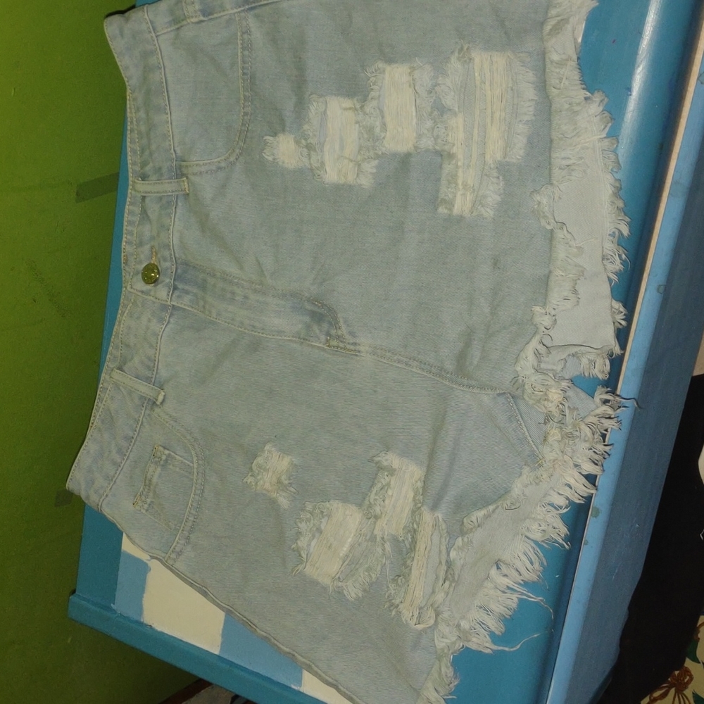 Light blue ripped jean shorts